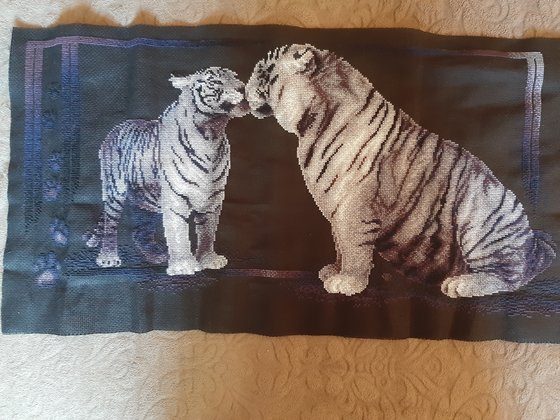 Работа «Два тигра целуются»