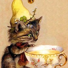 Котенок и чашка чая