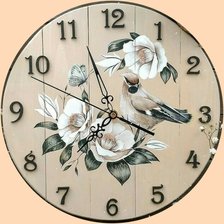 Часы с птичкой
