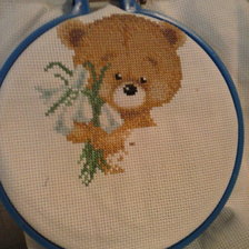 Работа «Мишка с цветочками»