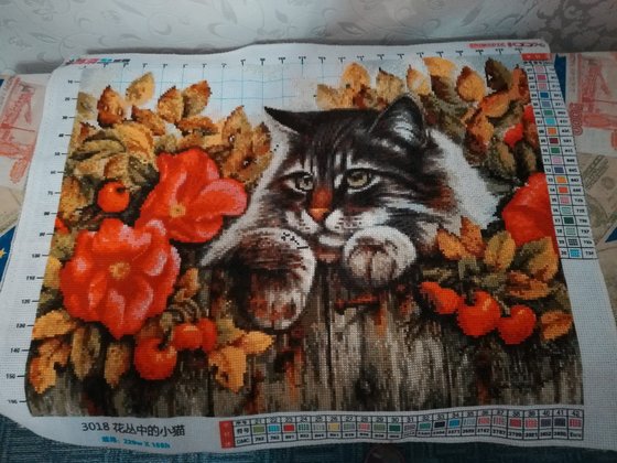 Работа «Кошечка с цветком»