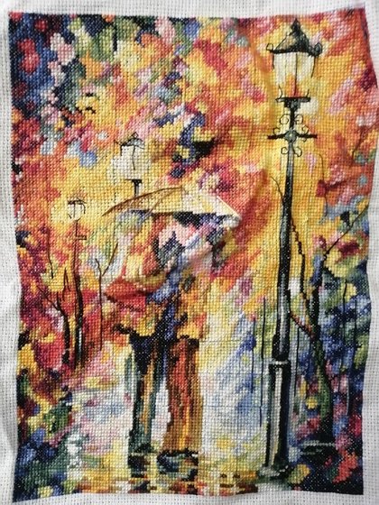 Работа «Поцелуй под дождем»