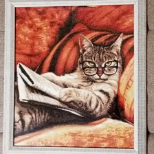 Работа «Кот, читающий газету.»