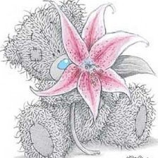 Мишка Тедди с цветком