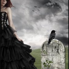 На кладбище.