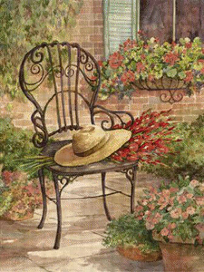 patio con silla y sombrero - предпросмотр