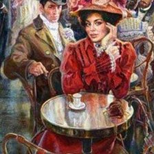 дама за столиком в кафе