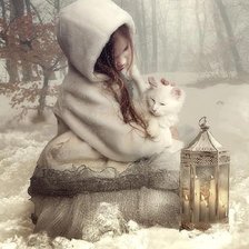 девочка с котенком зимой