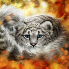 леопард в осенних листьях