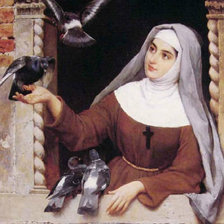 Монашка кормит голубей