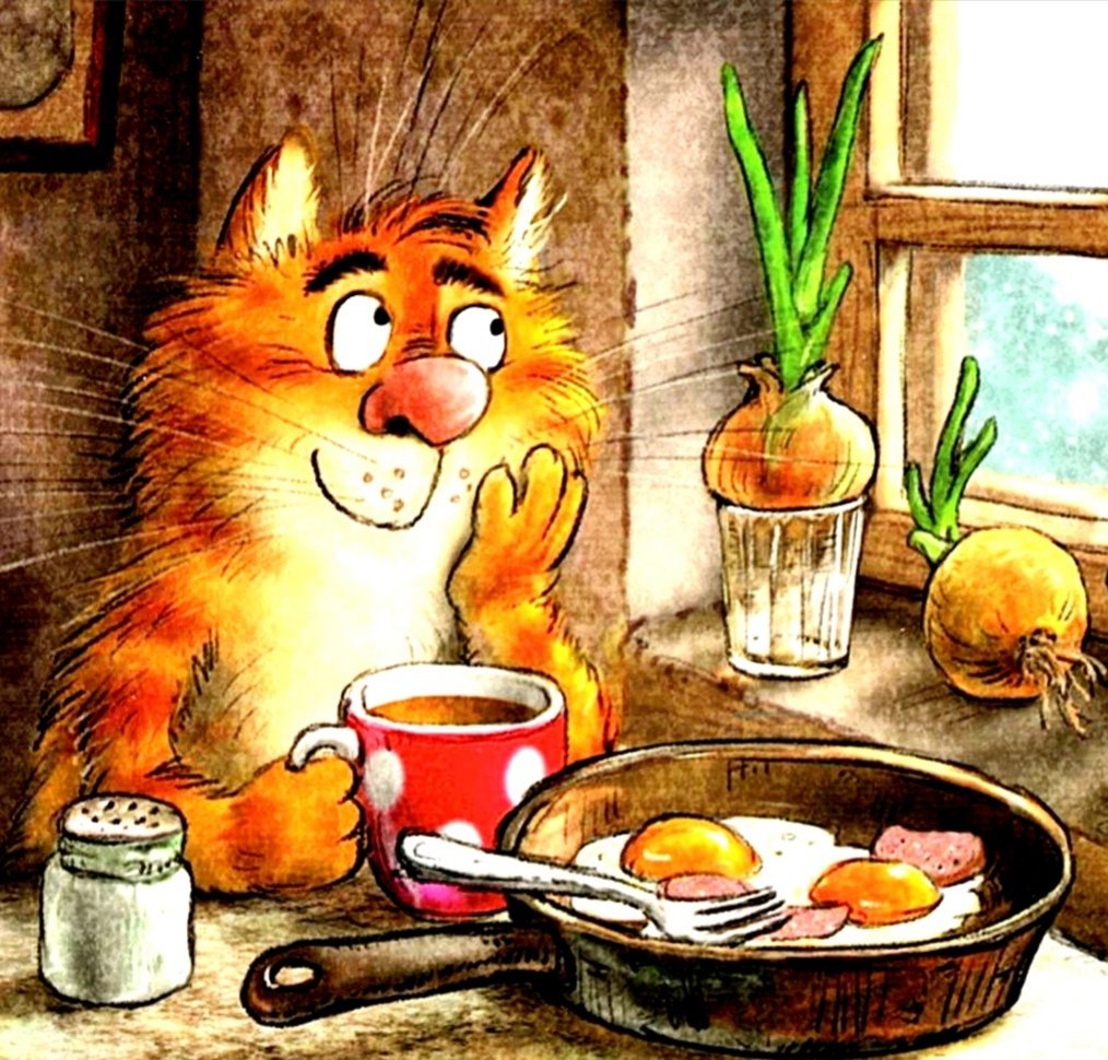 Рыжая кошка пьет чай