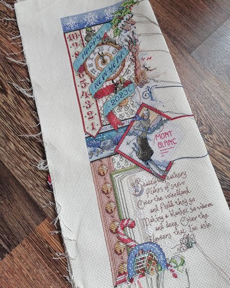 Этап процесса «Процесс вышивки Janlynn - Winter Sampler»