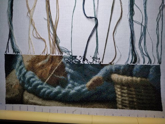 Этап процесса «Кот вязальщик»